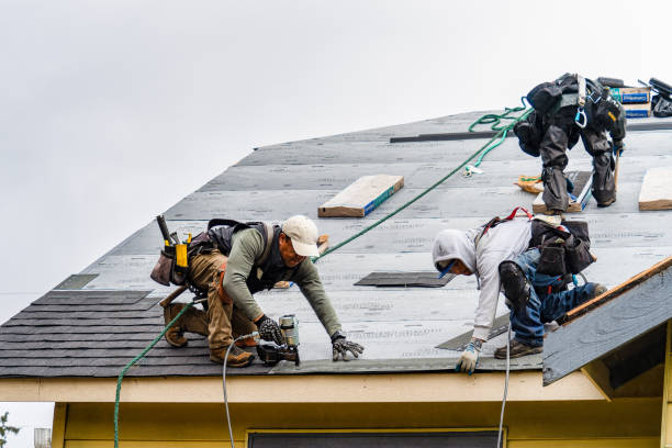 Professional Emergency Roof Repair technician working in Oakdale, NY
